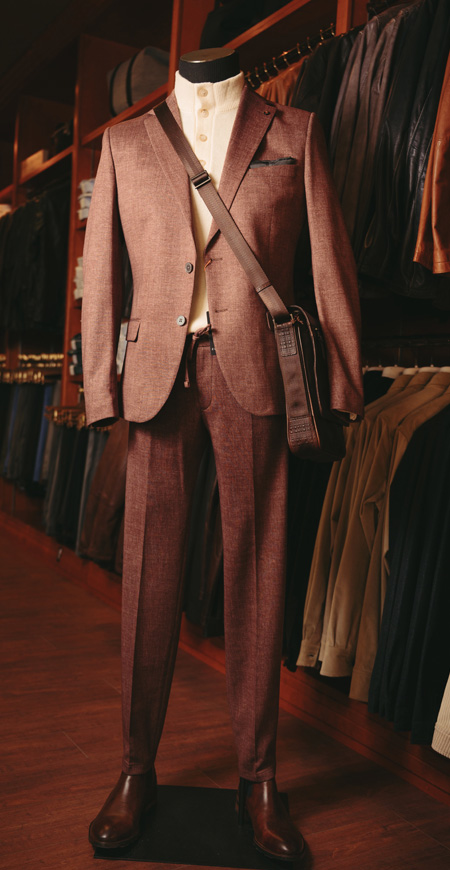 alt="Mens formal wear fashion for fall and winter of 2025. Copper sport jacket and pants from Landmark Clothiers"